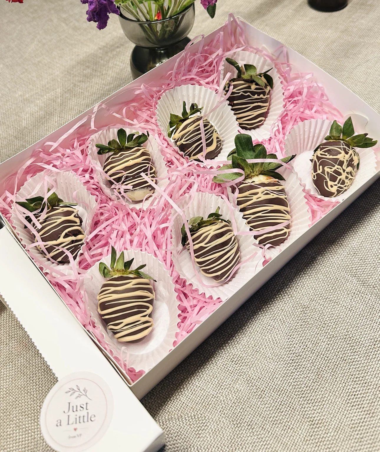 A gift box of chocolate-covered strawberries